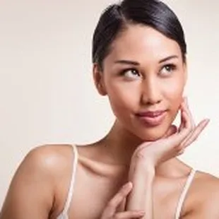 Advanced Dermatology &amp; Skin Cancer Specialists - woman with hand on face