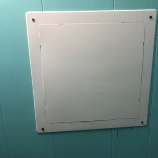 Ryan installed an access panel to our bathroom.