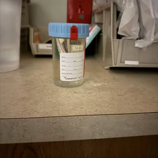 Urine sample...No name, no date, left on the counter to spoil...Hmm?  Yeah, it was mine.  Get it?