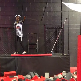 Trapeze into a foam pit