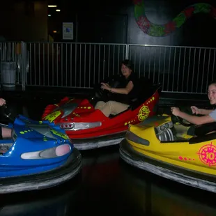 Bumper Cars under black-light.