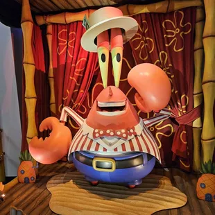 Interactive character Mr. K at the entrance