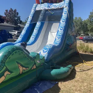 Tiki falls water bounce house