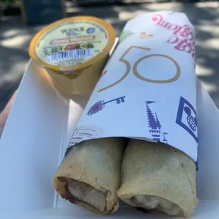 50th Anniversary Egg Rolls (pastrami, pepper Jack cheese, and honey mustard dipping sauce)