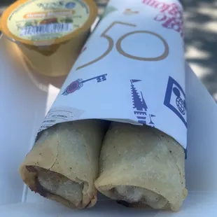 50th Anniversary Egg Rolls (pastrami, pepper Jack cheese, and honey mustard dipping sauce)