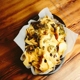 Pair one of our draft beers with these cheesy nachos