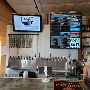 a woman sitting at a bar