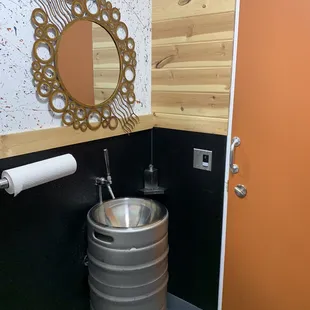 Interesting keg sink in the bathroom