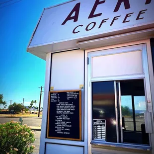 a sign for a coffee shop