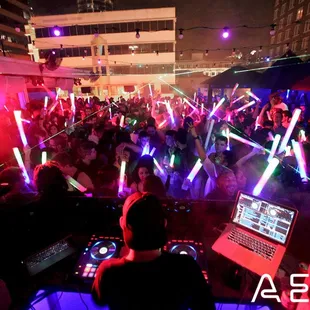a crowd of people at a party