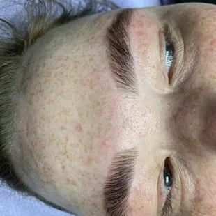 Finished brow lamination, wax and tint.