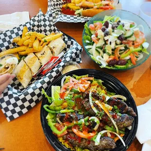 Kofta Bowl (front), Shawerma Sandwich (left), Greek Salad (right)