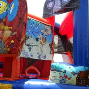 Inside: Slide w water spraying down, basket ball goal, punching bags.