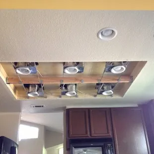 drywall repairs ceiling cans install before