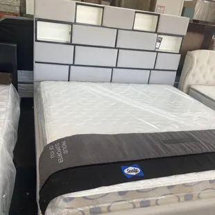 King bedrooms with touch on lights and phone outlet