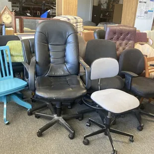 Hundreds of office and dining chairs of different kinds and qualities