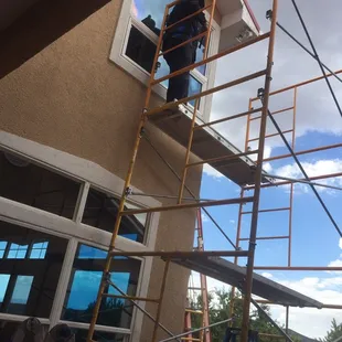Victor installing new window.