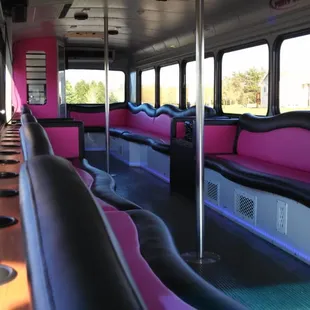 Pure Bliss is decked out with plush black and pink upholstery, 40 cup holders and a ridiculously loud 1900 watt sound system.