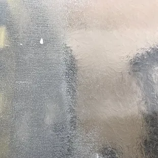Shower door restoration. Right side is done, left before.