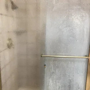 Left shower door restored, right still needs restoration.
