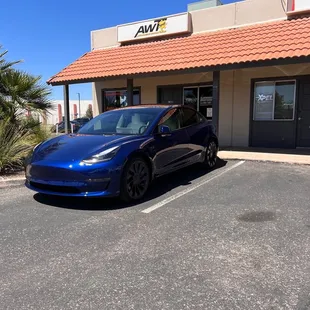 Tesla with tint and paint protection film