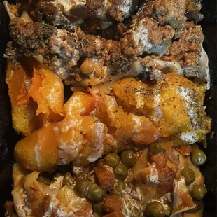 Hot Mazza Assortment Aushak, mantu, baadenjaan, kadoo, topped with garlic yogurt, dried mint and cayenne