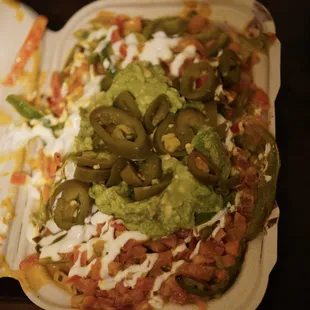 Medium Veggie Nachos. Lotsa toppings.