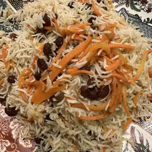 a plate of rice and vegetables