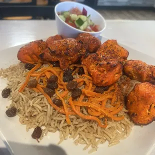 Qobli Pilov with chicken kabobs