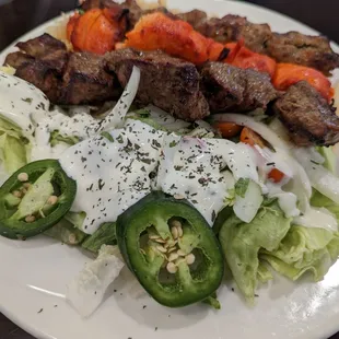 Deluxe kebab of chicken, shami, and lamb kabob.