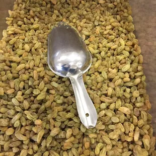 a spoon full of raisins