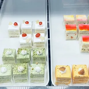 A display in front with sweet treats, pie and cakes!