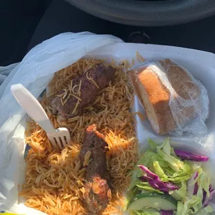 The kabob pieces on rice.