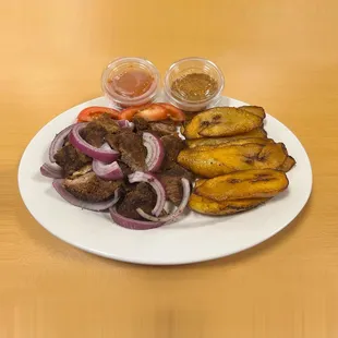 Lamb Suya served with plantains.