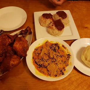 Chicken, egusi stew, fufu, rice