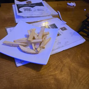 Food ($12.99, that we didn't order) served on top of the dirty table.