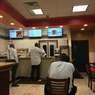 a group of people in a restaurant