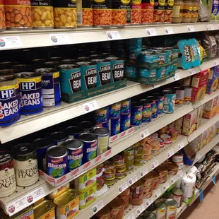 canned food on shelves in a grocery store