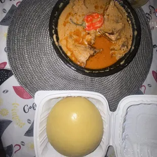 Fufu and peanut butter soup with fish (tilapia)