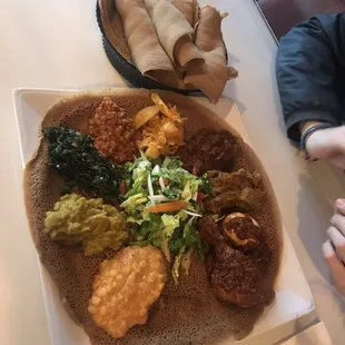 Vegetarian combo and meat combo on the same plate. Amazingggg