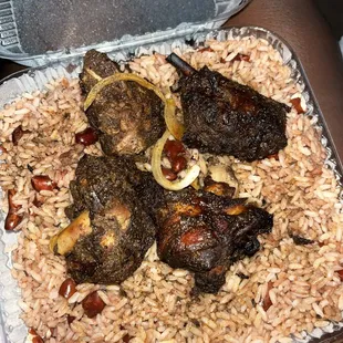 meat and rice in a container