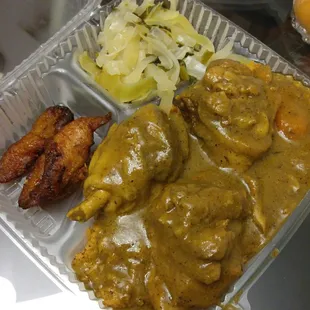 Curry chicken with jollof rice