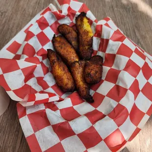Sweet , fried plantains-- the best I've ever had.  Perfectly fried (not sure if there's a thin batter or not but my oh my it's good)