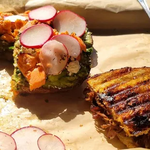 Avocado toast with grilled salmon and grilled cheese short rib