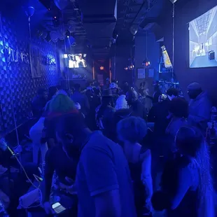 a crowd of people at a party