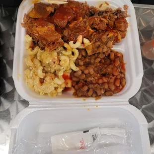 Stewed goat with beans and Mac and cheese