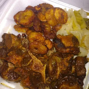 Oxtails Plantains and Cabbage