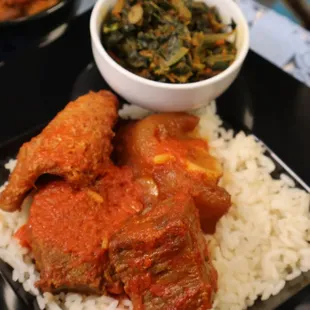 a plate of food with rice and meat