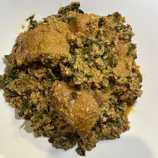 a square white plate of food