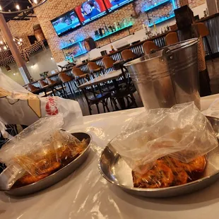 They serve your seafood bag on a plater tray! Love it